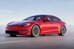 Tesla new electric car videos, Tesla new electric car launch, tesla to launch electric hatchback without a steering wheel, Tesla car